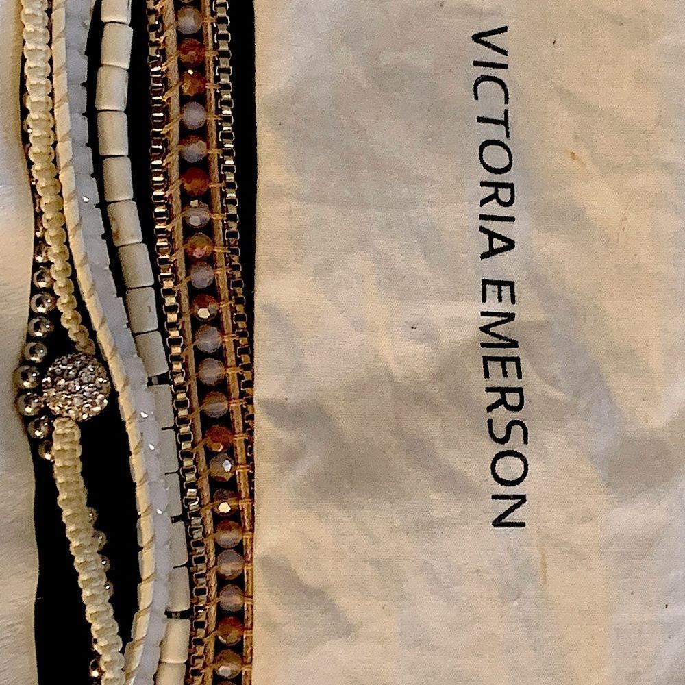 Victoria Emerson magnetic clasp with five sets of beads. Brand new a few marks